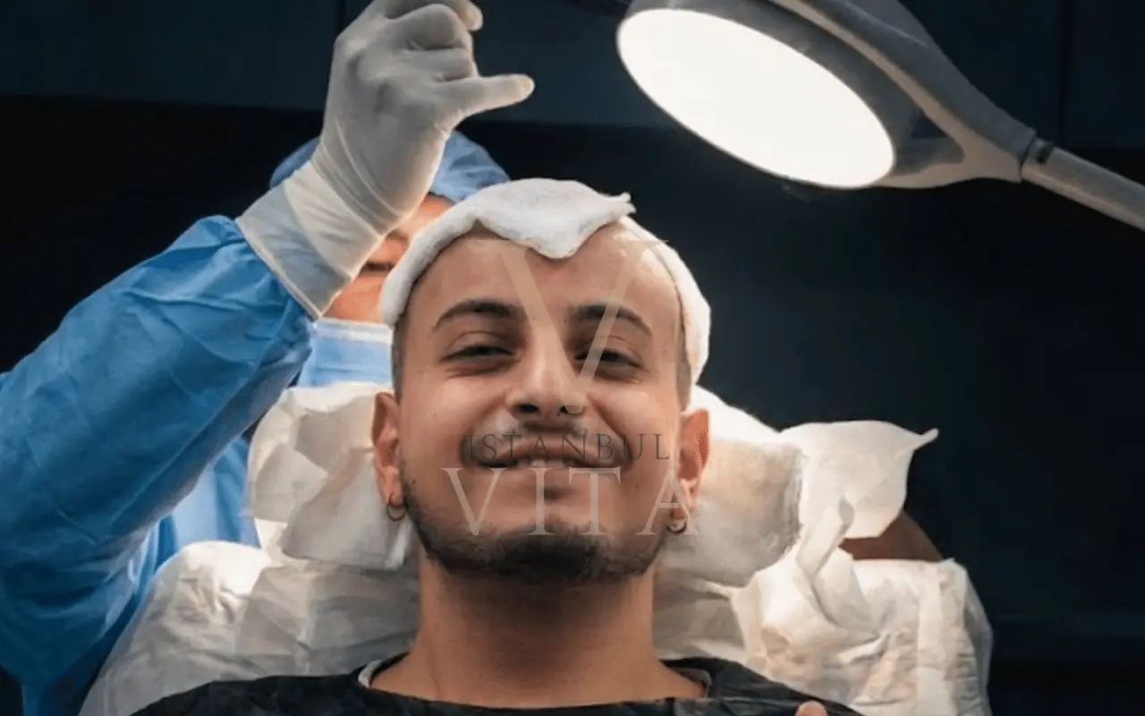 a man during the hair transplant surgery 